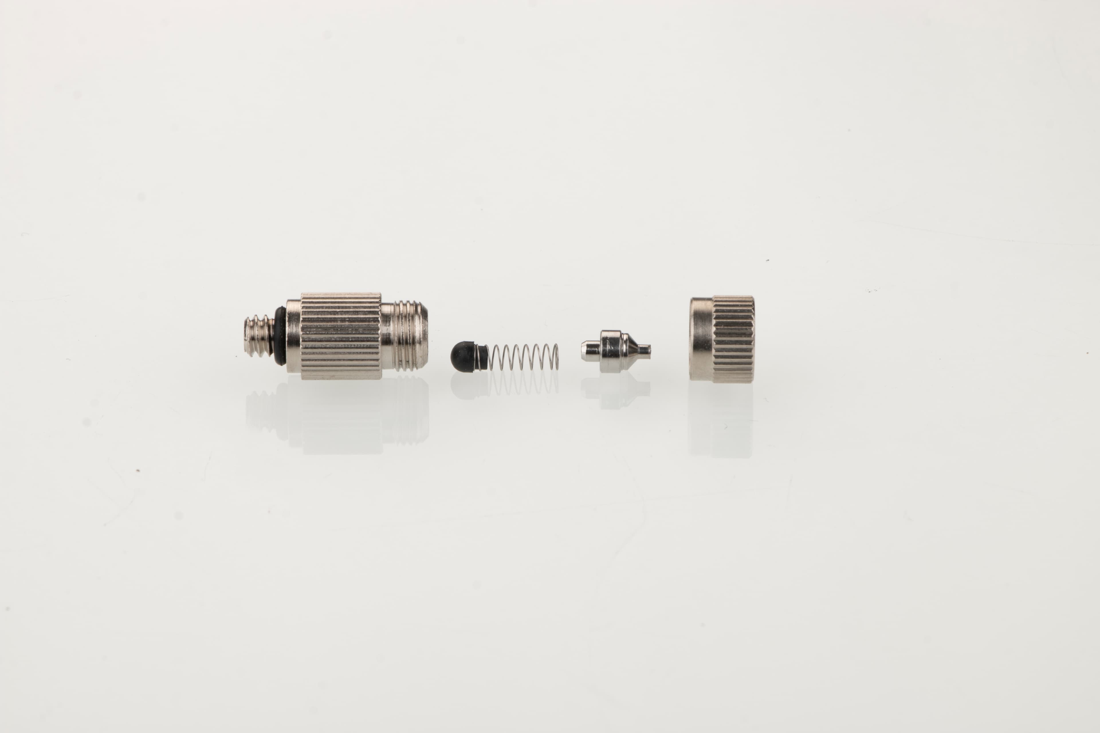 Two-stage ceramic nozzle exploded structure without filter screen